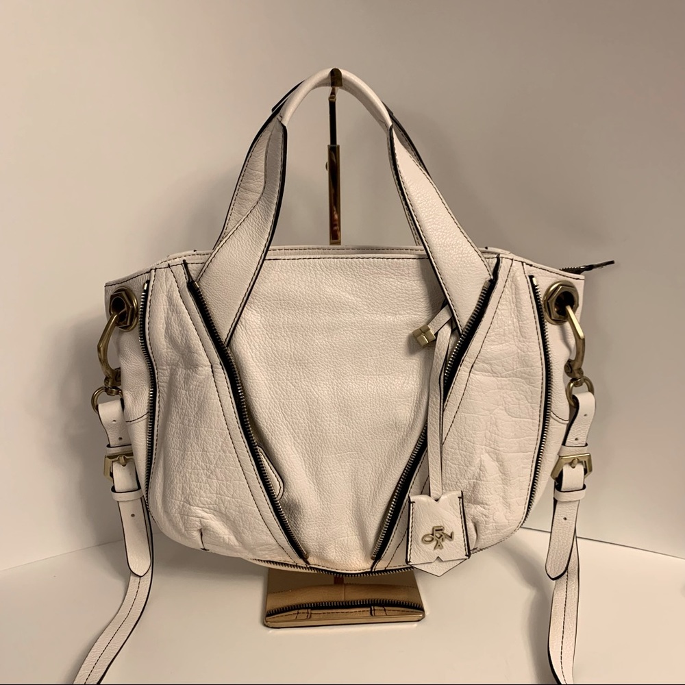 Oryany pebbled leather geometric crossbody handbag